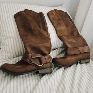 brown knee high boots with a buckle